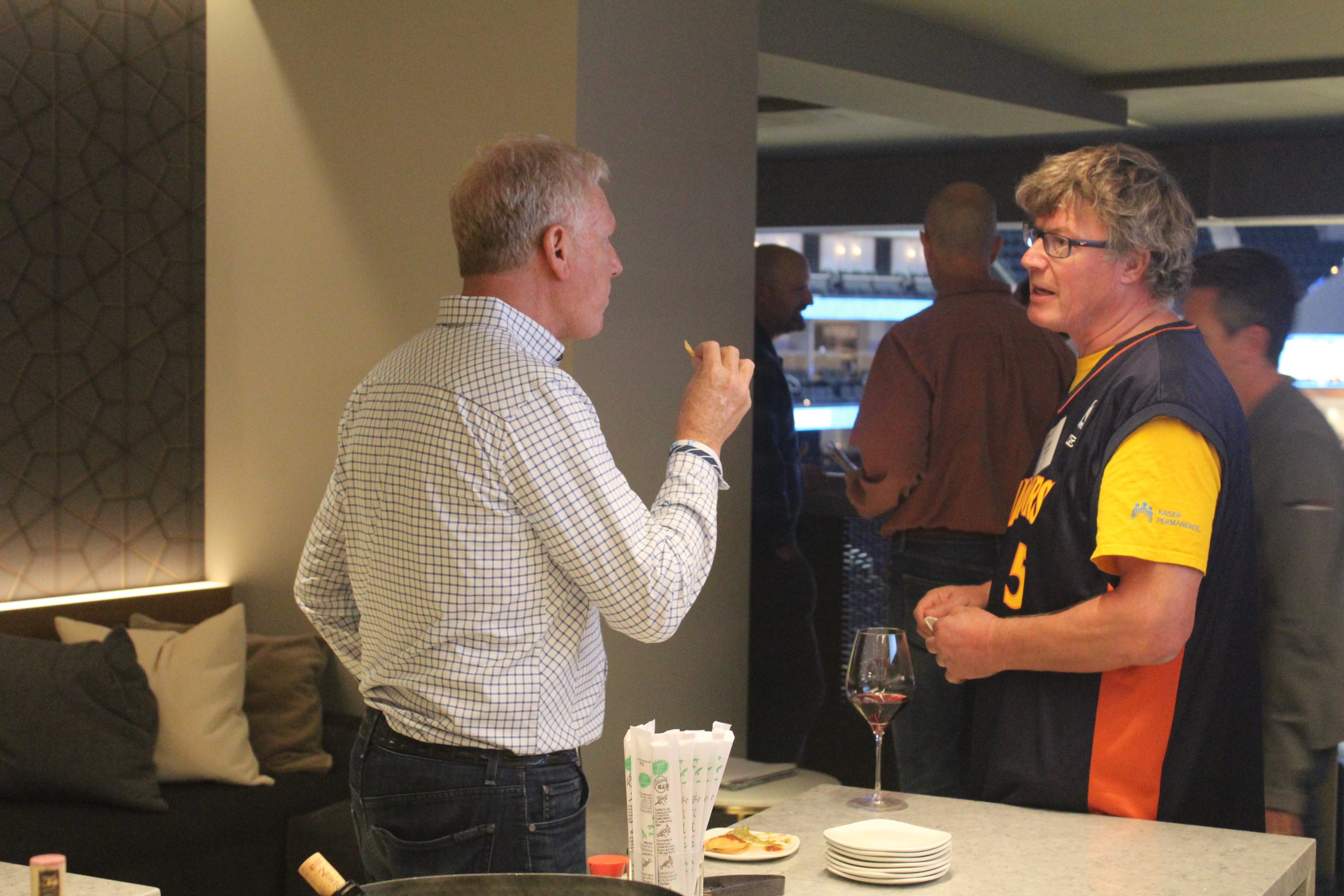 Attendees enjoy the suite at the Chase Center in San Francisco for the Warriors vs Grizzlies basketball game.